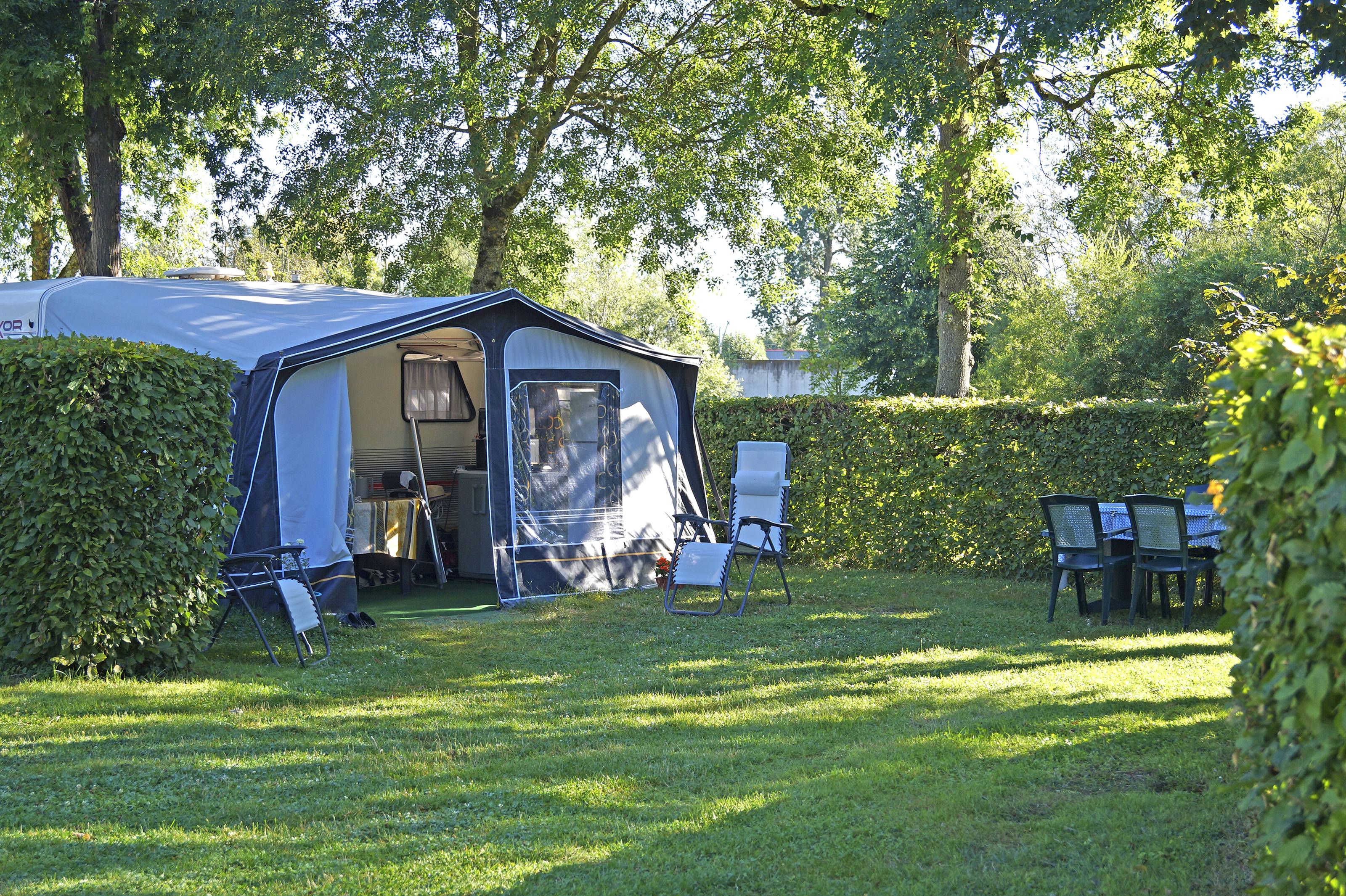Camping pitch with caravan